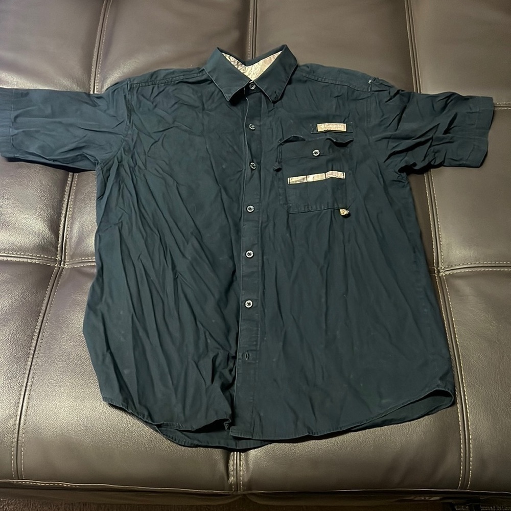 MEN'S or women's size medium camo Columbia shirt